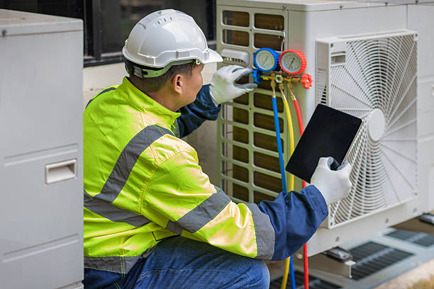 Professional Air Duct Cleaning technician working in Hoboken, NJ